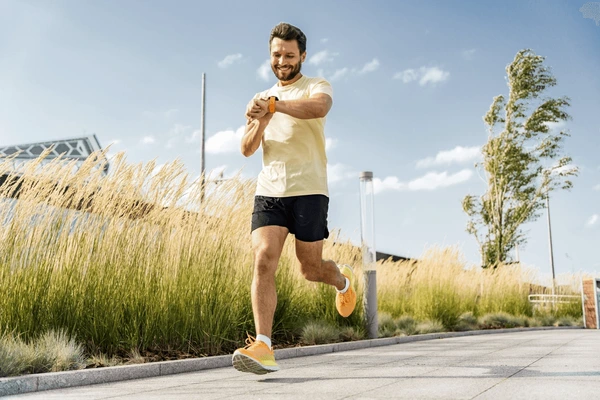 man checking progress on fitness